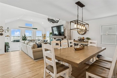Welcome to 246 W Bay Drive, a stunning waterfront retreat in the - photo 9