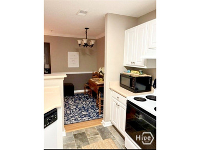 Enjoy coffee on your private patio! This charming 1BR/1BA condo - photo 6
