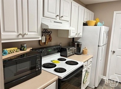 Enjoy coffee on your private patio! This charming 1BR/1BA condo - photo 7