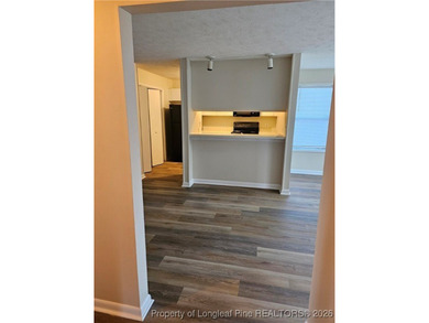 Step into easy living with this beautifully refreshed and - photo 4