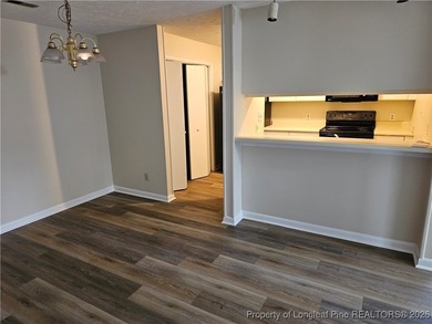Step into easy living with this beautifully refreshed and - photo 5