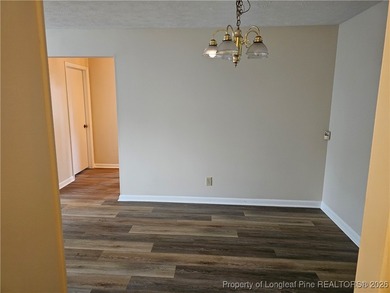 Step into easy living with this beautifully refreshed and - photo 6
