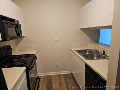Step into easy living with this beautifully refreshed and - photo 9