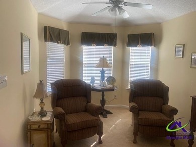 Enjoy the lovely view of the golf course from the screened-in - photo 2
