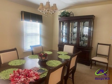 Enjoy the lovely view of the golf course from the screened-in - photo 3