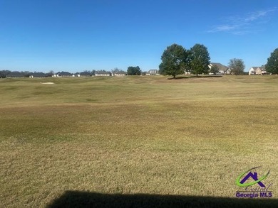 Enjoy the lovely view of the golf course from the screened-in - photo 5