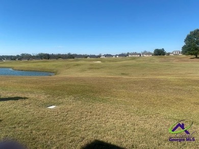 Enjoy the lovely view of the golf course from the screened-in - photo 6