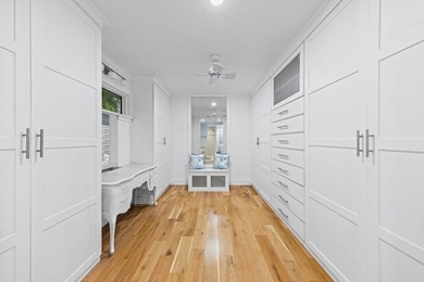 Discover a rare blend of coastal elegance and serene lakefront - photo 12