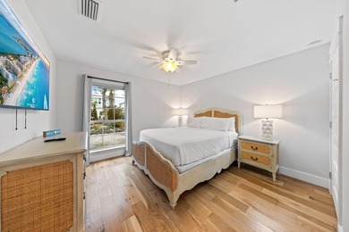 Discover a rare blend of coastal elegance and serene lakefront - photo 15