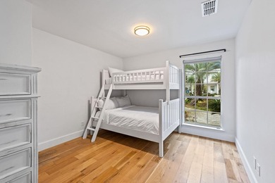 Discover a rare blend of coastal elegance and serene lakefront - photo 16