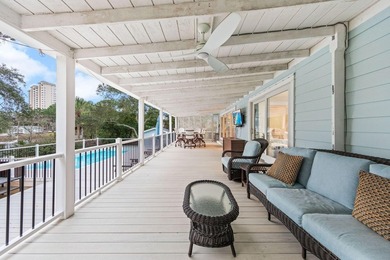 Discover a rare blend of coastal elegance and serene lakefront - photo 19