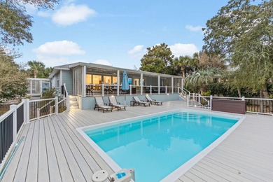 Discover a rare blend of coastal elegance and serene lakefront - photo 20