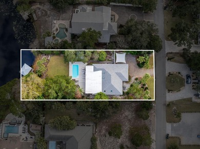 Discover a rare blend of coastal elegance and serene lakefront - photo 21