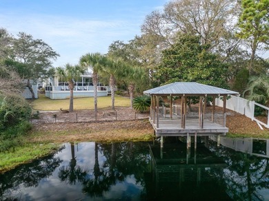 Discover a rare blend of coastal elegance and serene lakefront - photo 22