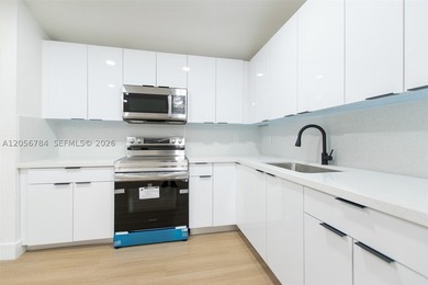 Turn-Key 4-Bedroom Gem in the Heart of Allapattah! Discover the - photo 8