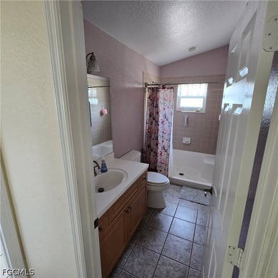 Welcome to this charming 3-bedroom, 2-bathroom home nestled in a - photo 14