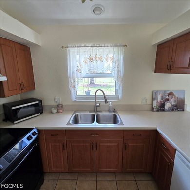 Welcome to this charming 3-bedroom, 2-bathroom home nestled in a - photo 31