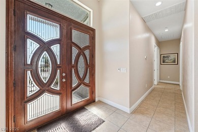 Welcome to this thoughtfully custom built Henderson home