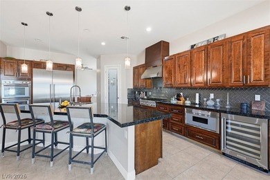 Welcome to this thoughtfully custom built Henderson home