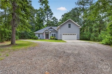 Tucked away on 1.43 private acres surrounded by mature trees - photo 1