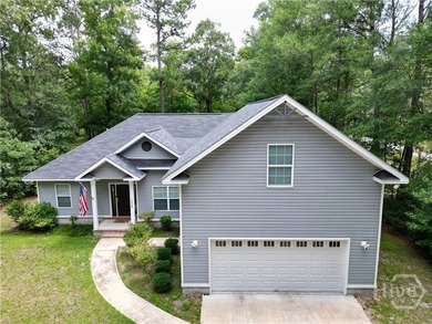 Tucked away on 1.43 private acres surrounded by mature trees - photo 3