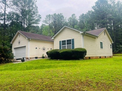 Welcome to 202 Landing Lane! Nestled on a private wooded lot - photo 2