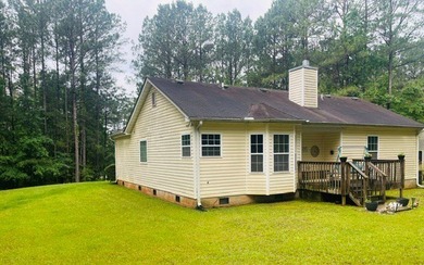 Welcome to 202 Landing Lane! Nestled on a private wooded lot - photo 3