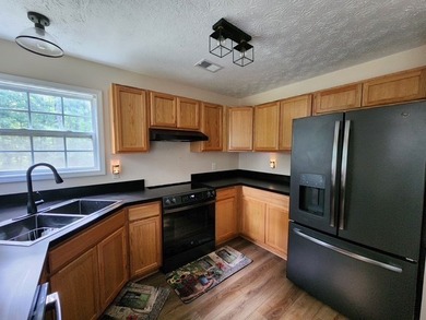 Welcome to 202 Landing Lane! Nestled on a private wooded lot - photo 8