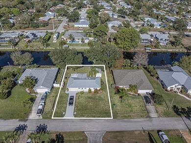 Now this is the total package! Waterfront + renovated 2/2 + - photo 1