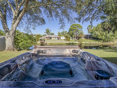 Now this is the total package! Waterfront + renovated 2/2 + - photo 3
