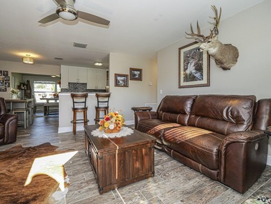 Now this is the total package! Waterfront + renovated 2/2 + - photo 8