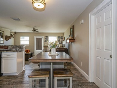 Now this is the total package! Waterfront + renovated 2/2 + - photo 10