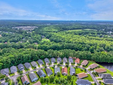 Set in a peaceful, park-like setting, this lovingly maintained - photo 45