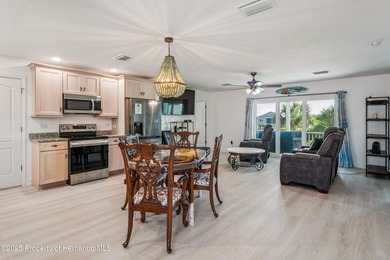 This elevated 2022 Gulfstream Homes custom build delivers modern - photo 6