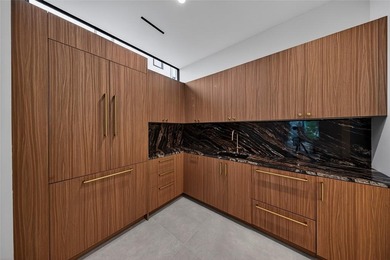 Why have another house looking into your backyard? This newly