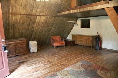 Lots of potential in this cute A-frame home tucked away on a - photo 6