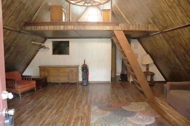 Lots of potential in this cute A-frame home tucked away on a - photo 7