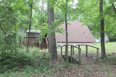 Lots of potential in this cute A-frame home tucked away on a - photo 8