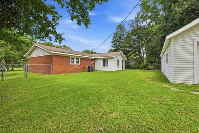 Welcome home to this beautifully updated 3-bedroom, 2-bath brick - photo 31