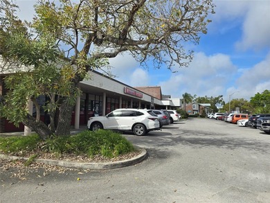 Fully leased out with long-term tenants, this commercial - photo 2