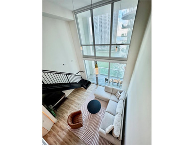 Wake up to water views and natural light pouring through 20-foot