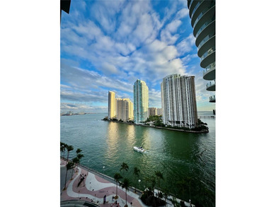 Wake up to water views and natural light pouring through 20-foot