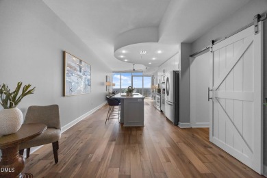 Welcome to this stunning 2-bedroom, 2-bath condo perched on the