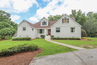 Location, location, location. This beautiful brick home sits on - photo 1