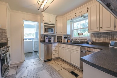 Location, location, location. This beautiful brick home sits on - photo 5