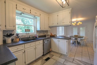 Location, location, location. This beautiful brick home sits on - photo 6