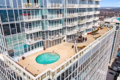 Welcome to this stunning 2-bedroom, 2-bath condo perched on the