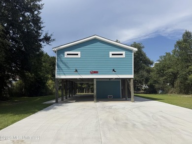Completely remodeled inside and out, this waterfront coastal - photo 1