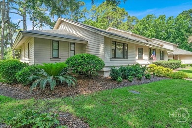 This exceptionally updated, one-level end unit on the lagoon is - photo 4