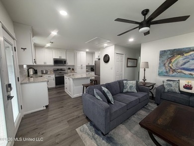 Completely remodeled inside and out, this waterfront coastal - photo 4